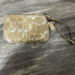 Coach gold wristlet